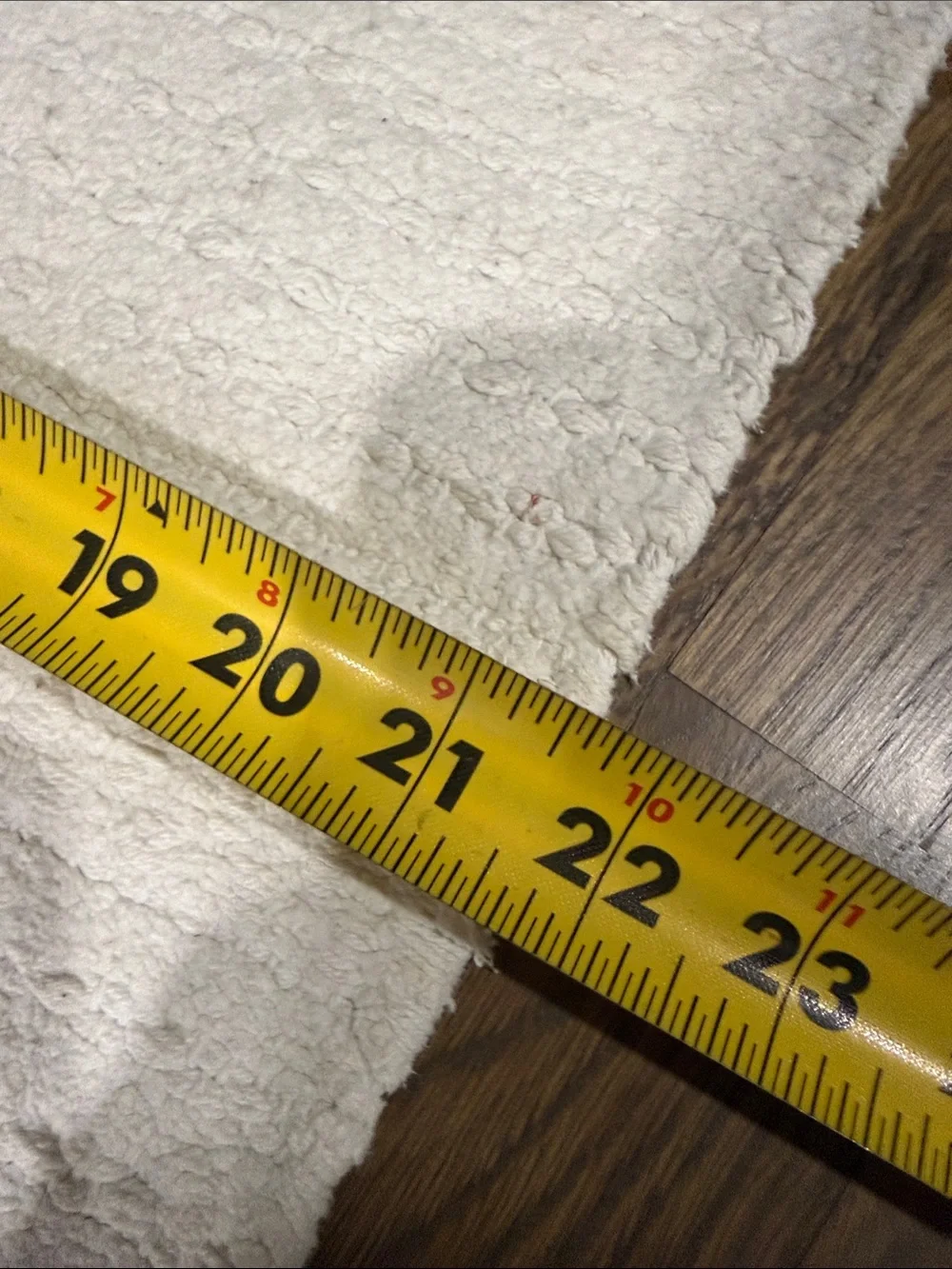 Magnolia Cream Textured Bath Mat with Tassels